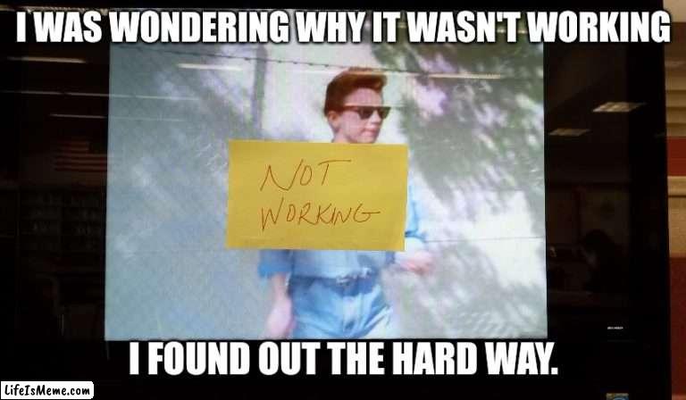 The library computer wasn't working. | I WAS WONDERING WHY IT WASN'T WORKING; I FOUND OUT THE HARD WAY. | image tagged in rick astley | made w/ Lifeismeme meme maker