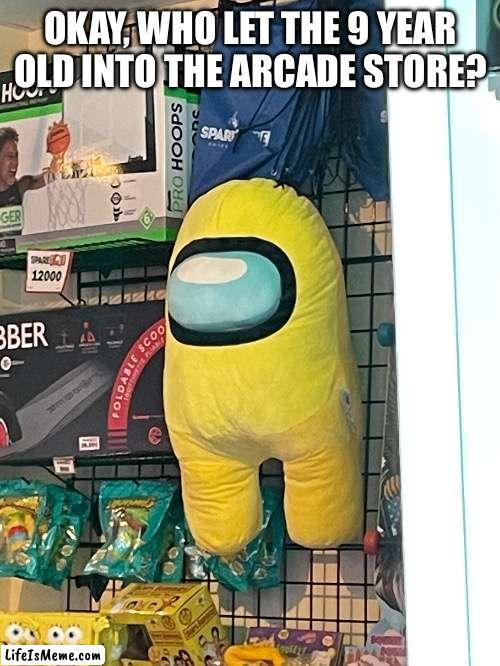 Umm. Sus. Ig | OKAY, WHO LET THE 9 YEAR OLD INTO THE ARCADE STORE? | image tagged in 9 year old,sus,among us,arcade,let,spooky sussy skeletons | made w/ Lifeismeme meme maker
