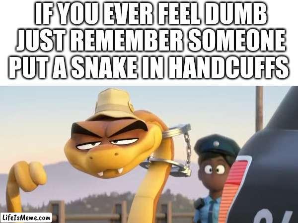 A snake in handcuffs | IF YOU EVER FEEL DUMB JUST REMEMBER SOMEONE PUT A SNAKE IN HANDCUFFS | image tagged in snake,handcuffs | made w/ Lifeismeme meme maker