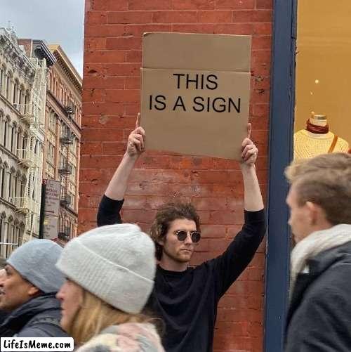 average protester | THIS IS A SIGN | image tagged in memes,guy holding cardboard sign | made w/ Lifeismeme meme maker