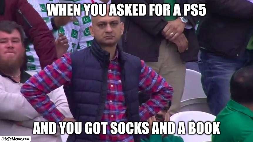 Books do be good doe | WHEN YOU ASKED FOR A PS5; AND YOU GOT SOCKS AND A BOOK | image tagged in disappointed muhammad sarim akhtar,dissapointed,sad,ps5,video games,books | made w/ Lifeismeme meme maker